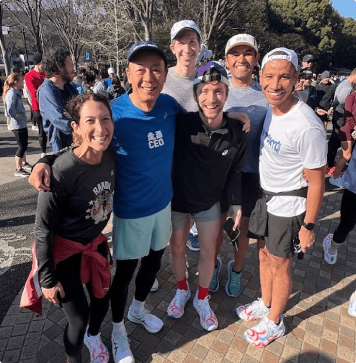 Members of the Neurun team with fellow runners at a race start